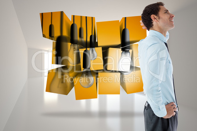 Composite image of thinking businessman with hand on head