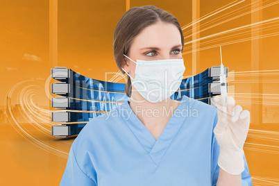 Composite image of pretty brunette female doctor holding a syrin