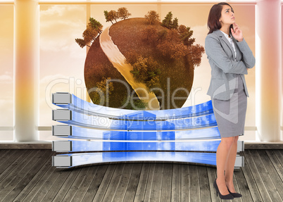 Composite image of focused businesswoman