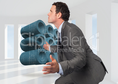 Composite image of businessman posing with hands out