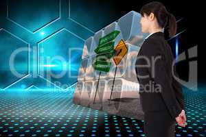 Composite image of businesswoman standing