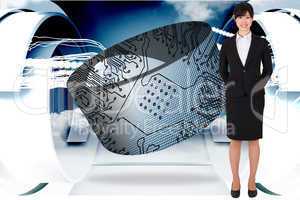 Composite image of businesswoman standing