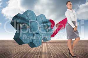 Composite image of focused businesswoman