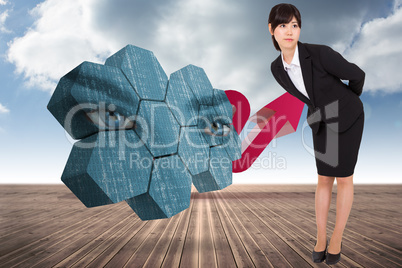 Composite image of serious businesswoman bending