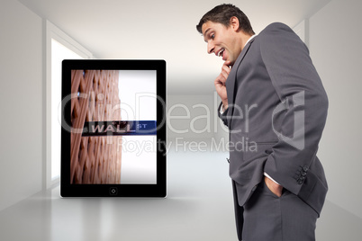 Composite image of thoughtful businessman with hand on chin