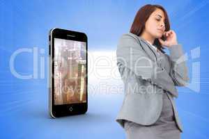 Composite image of focused businesswoman