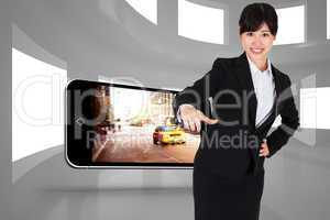 Composite image of smiling businesswoman pointing