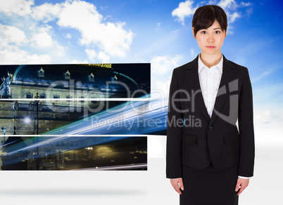 Composite image of serious businesswoman