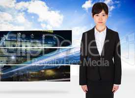 Composite image of serious businesswoman