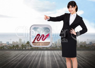 Composite image of smiling businesswoman pointing