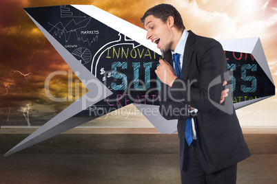 Composite image of thinking businessman holding pen