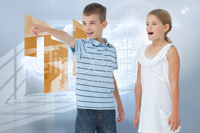 Composite image of young boy showing something to his sister