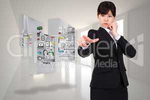 Composite image of businesswoman pointing