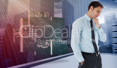 Composite image of thoughtful businessman with hand on chin