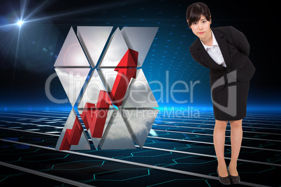 Composite image of serious businesswoman bending