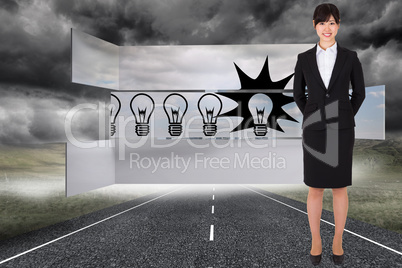 Composite image of businesswoman standing