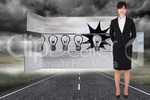 Composite image of businesswoman standing