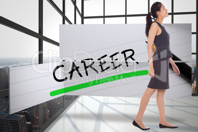 Composite image of asian businesswoman walking