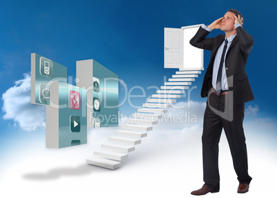 Composite image of stressed businessman with hands on head