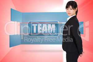 Composite image of serious businesswoman