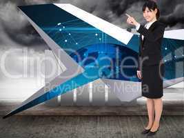 Composite image of smiling businesswoman pointing