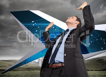 Composite image of businessman posing with arms raised