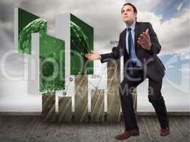 Composite image of businessman posing with arms outstretched