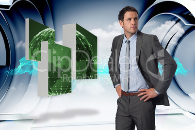 Composite image of serious businessman with hands on hips