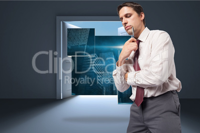 Composite image of thoughtful businessman holding pen to chin