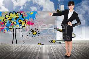 Composite image of smiling businesswoman pointing