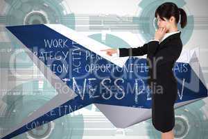 Composite image of businesswoman pointing