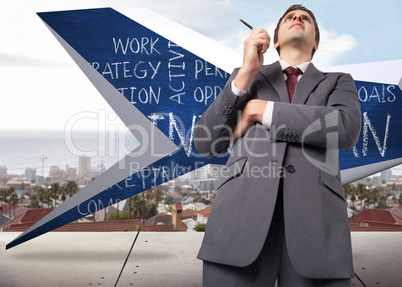 Composite image of thoughtful businessman holding pen