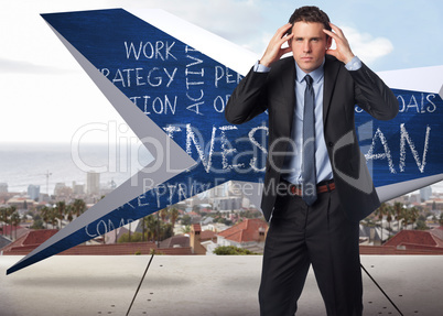 Composite image of stressed businessman with hands on head