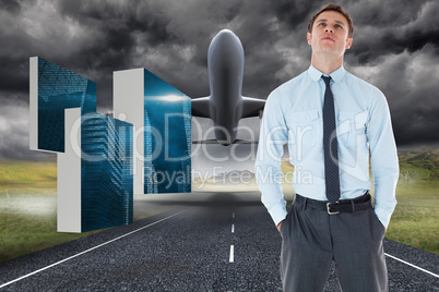 Composite image of serious businessman standing with hands in po