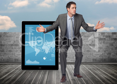 Composite image of businessman standing with arms out