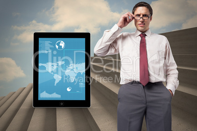 Composite image of thinking businessman touching his glasses