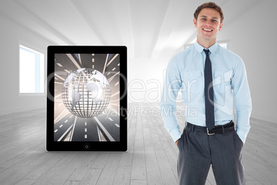 Composite image of smiling businessman standing with hand in poc