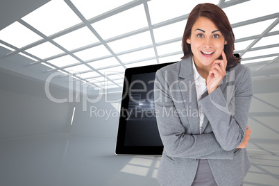 Composite image of smiling thoughtful businesswoman