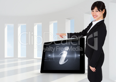 Composite image of smiling businesswoman pointing