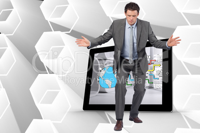 Composite image of businessman standing with arms out