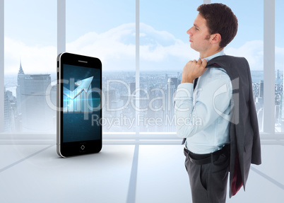 Composite image of serious businessman holding his jacket