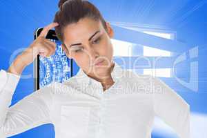 Composite image of focused businesswoman