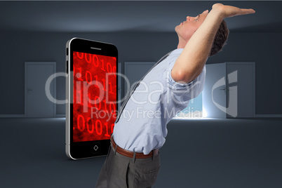 Composite image of businessman standing with hands up