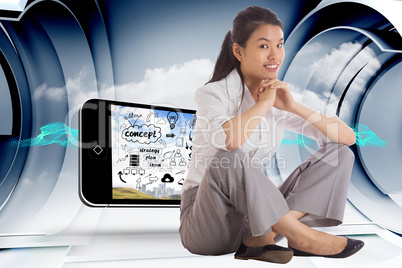 Composite image of smiling businesswoman sitting with hands toge