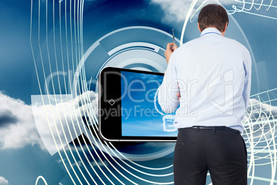 Composite image of thinking businessman holding pen