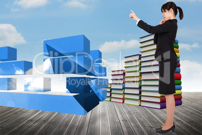 Composite image of thoughtful businesswoman pointing