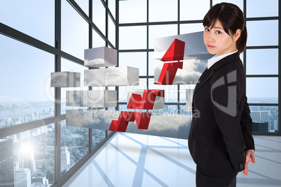 Composite image of serious businesswoman