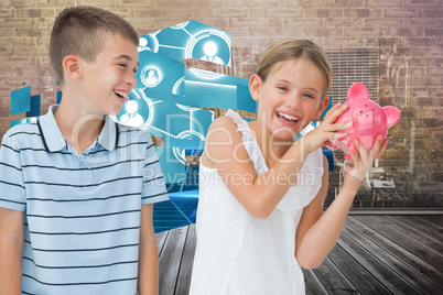 Composite image of smiling young girl holding piggy bank