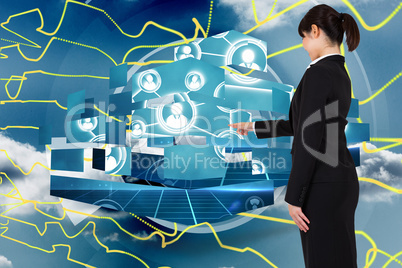 Composite image of businesswoman pointing