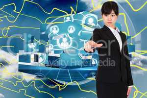 Composite image of focused businesswoman pointing